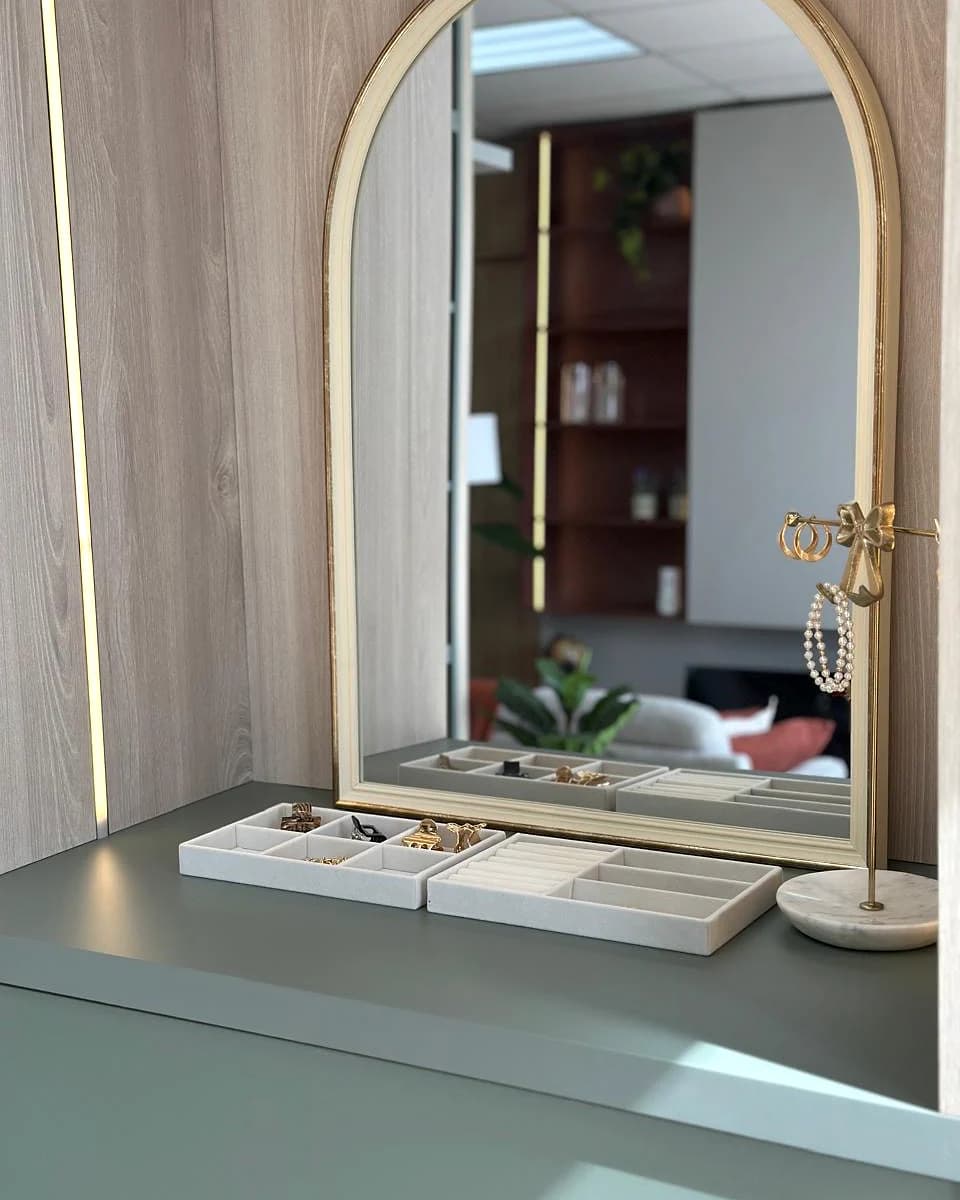 Close view of a fitted vanity, edge detail and integrated storage