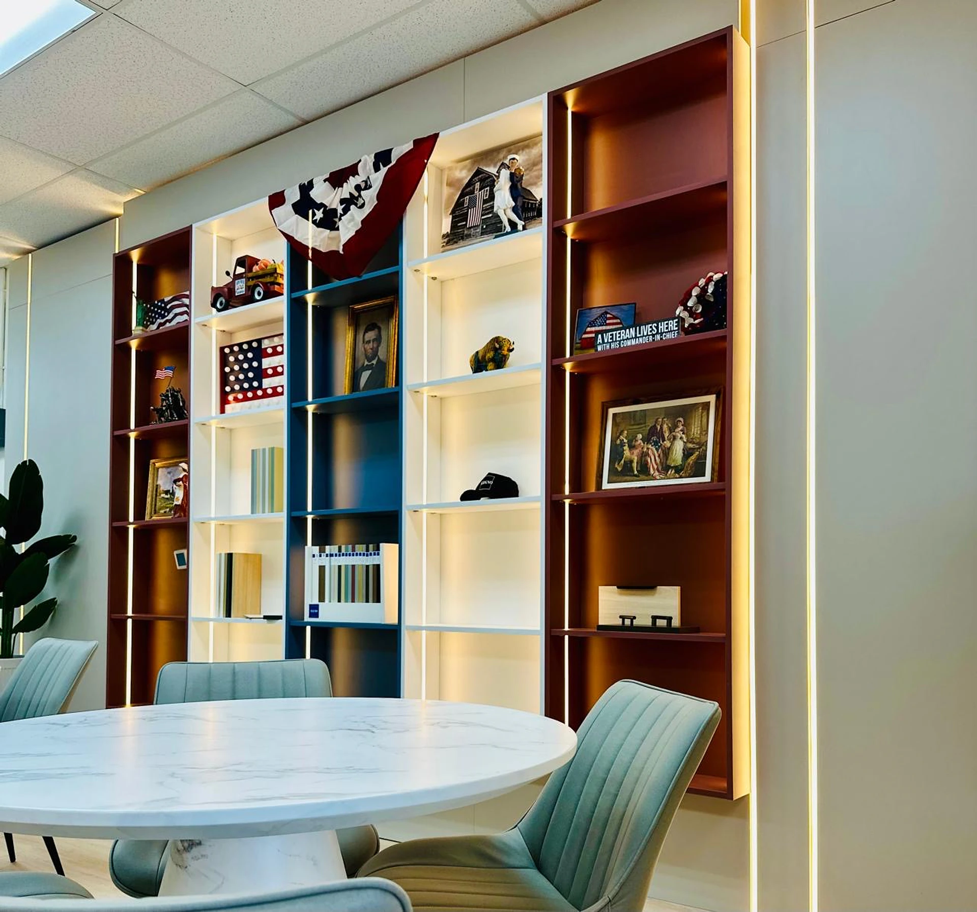 Colorful architectural shelving wall with integrated lighting